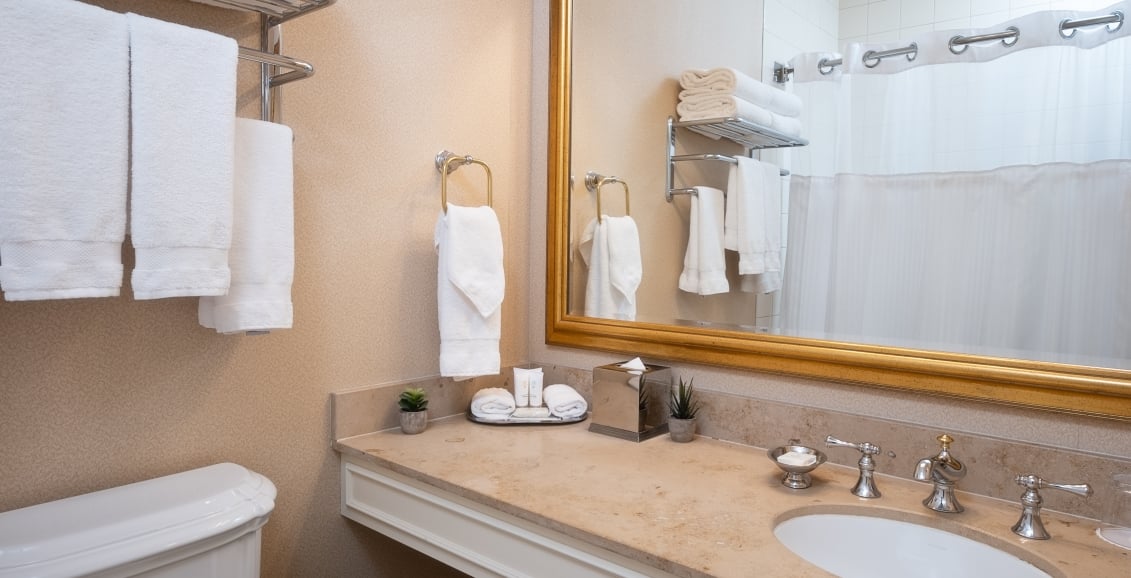 Bathroom with sink, mirror and toilet