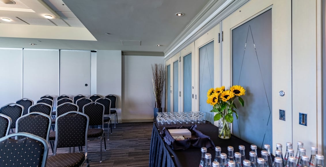 Bottles of water and glasses at the hawthorn room