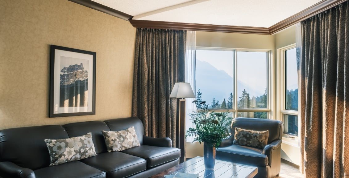 couch and coffee table in hotel room