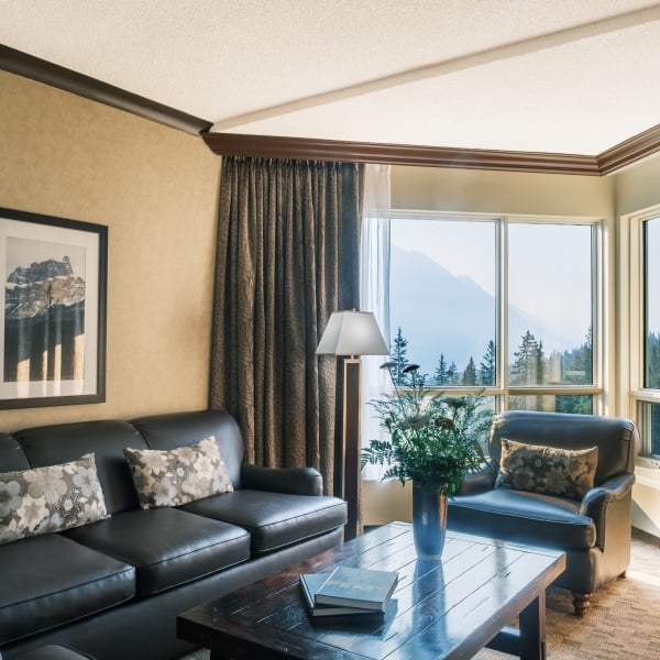 couch and coffee table in hotel room