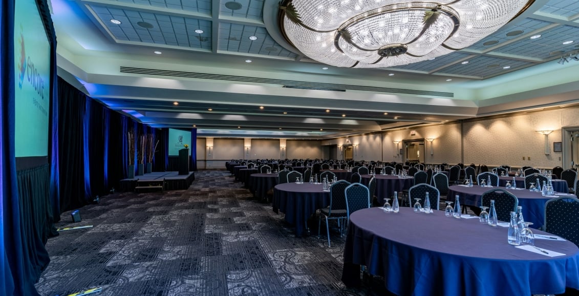 A large hall with chairs and tables