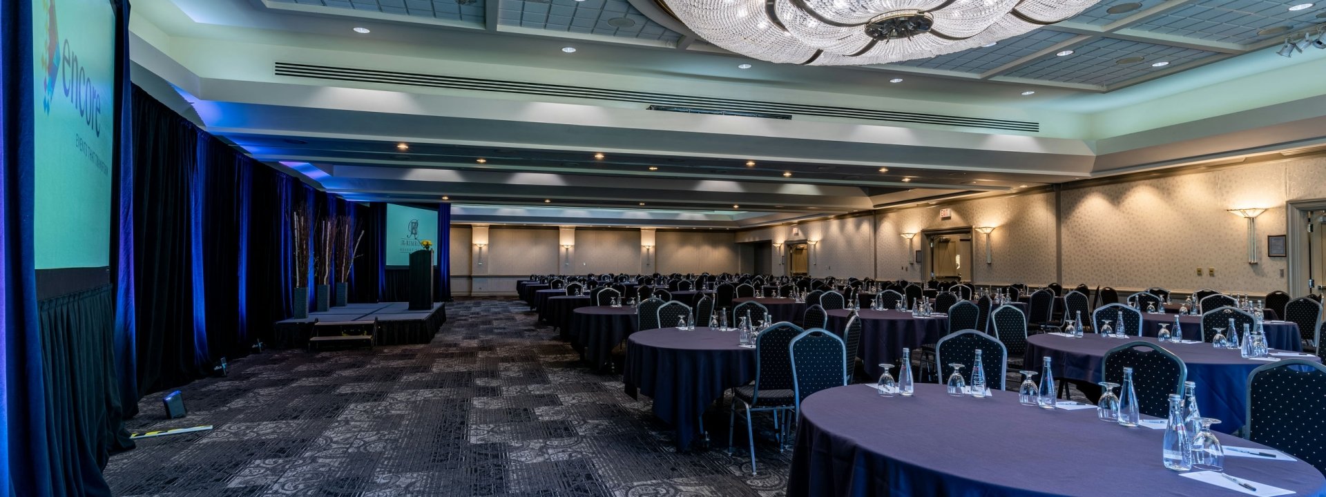 A large hall with chairs and tables