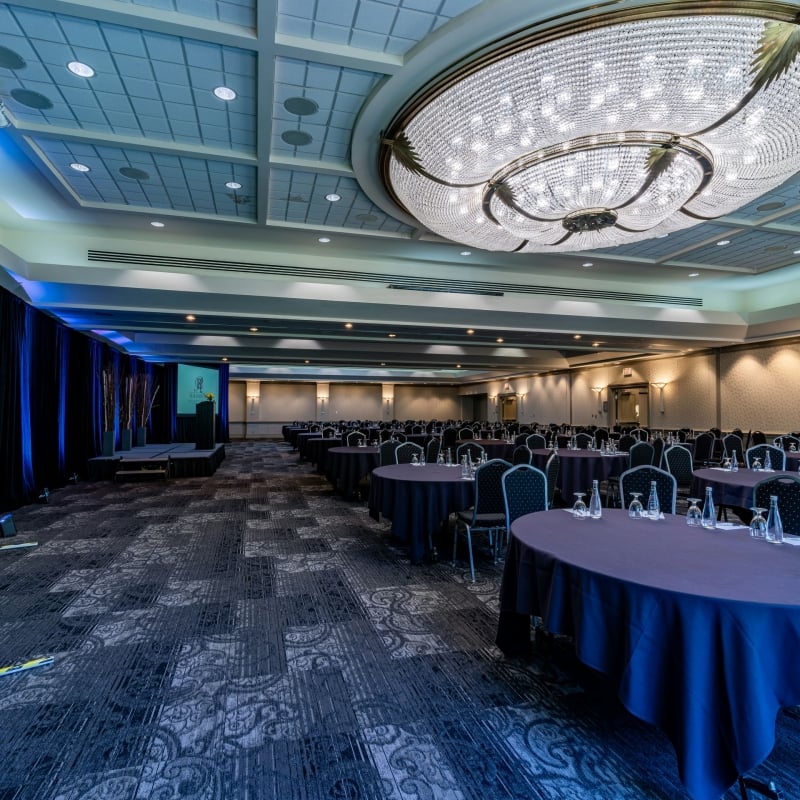 A large hall with chairs and tables