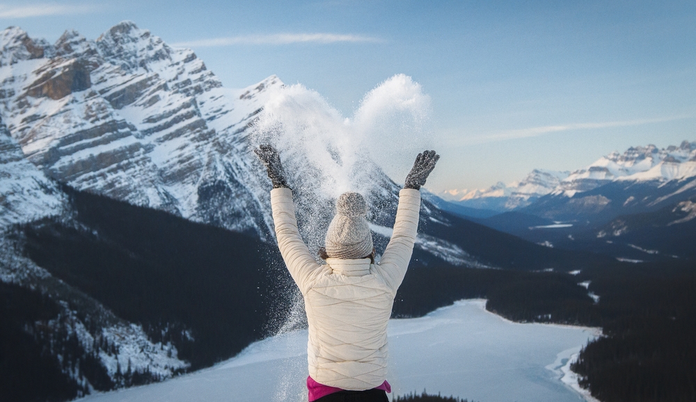 Girl in snow above Peyto