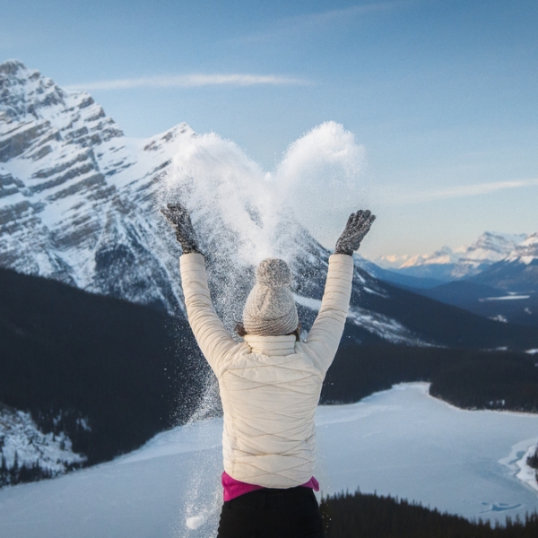 Girl in snow above Peyto