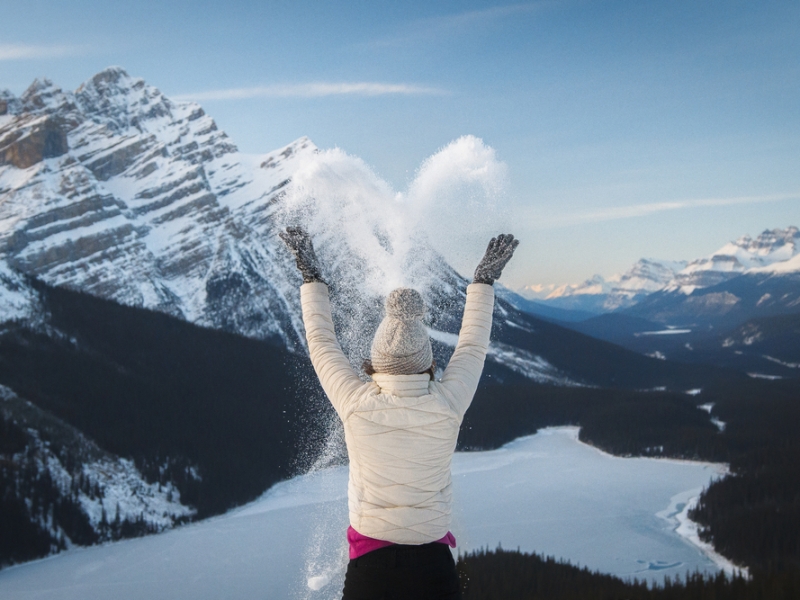 Girl in snow above Peyto