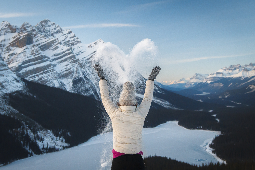 Girl in snow above Peyto