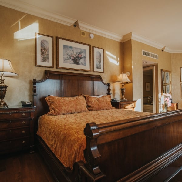 View of bed and living room