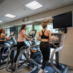 Girls running on cardio equipment