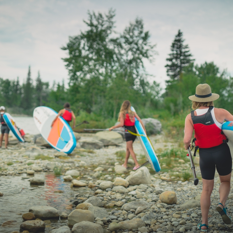 Kelsey's Caravan teaching people how to SUP