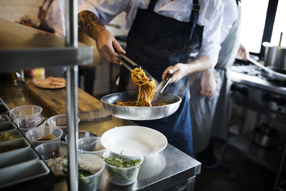 man cooking pasta