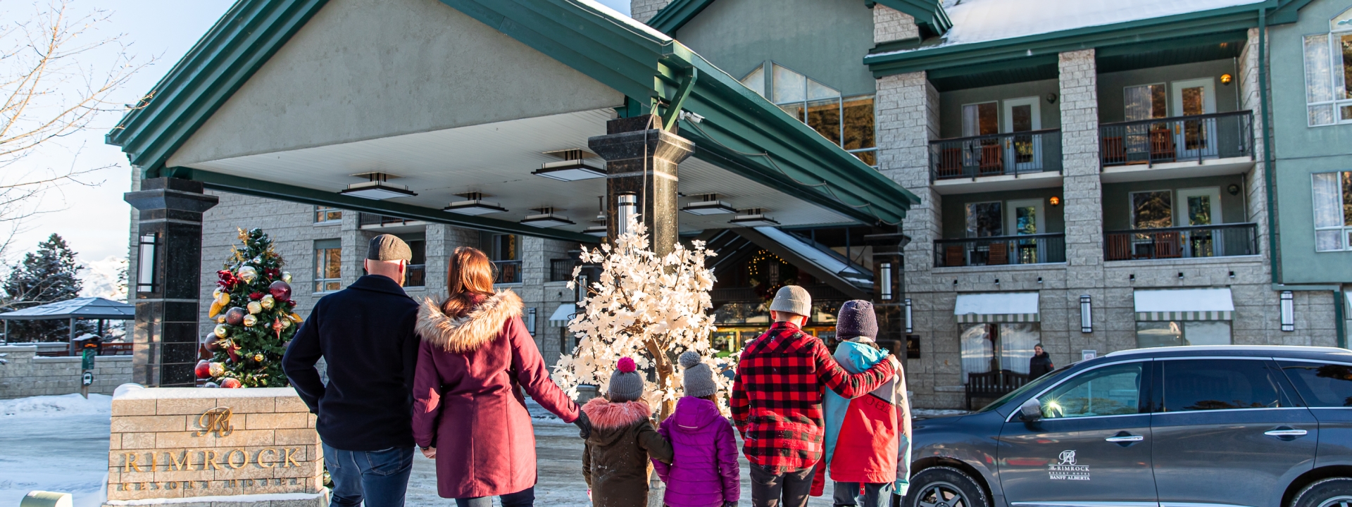 Family arriving at The Rimrock