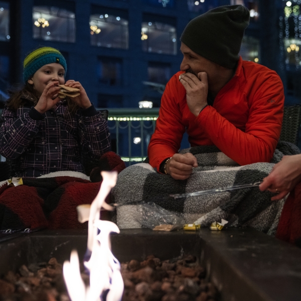 Family around the fire