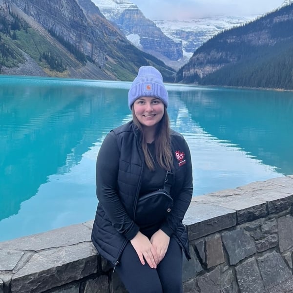 woman standing in from of Lake Louise