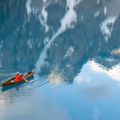 A man canoeing in Moraine Lake