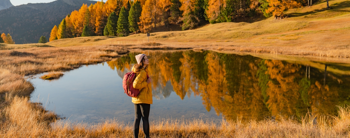 woman walking in larch valley in banff national park