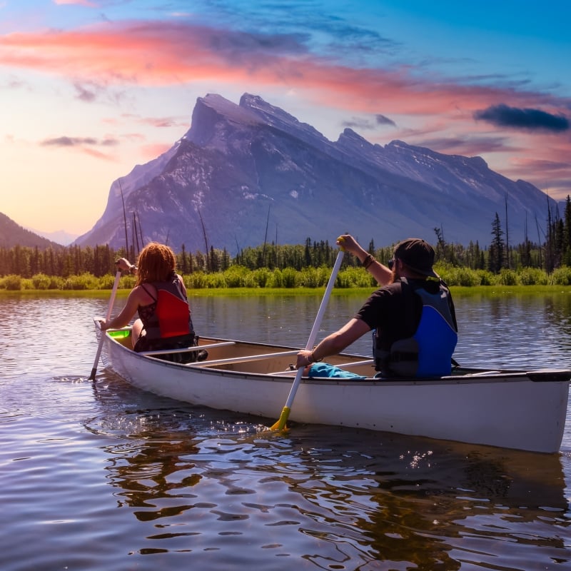 a couple kayaking on Vermillion Lakes in Banff National Park