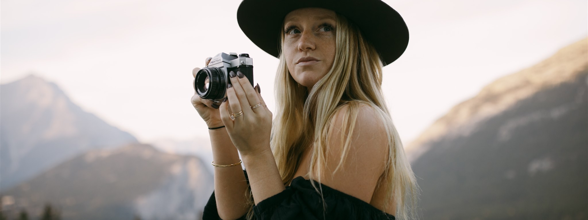 Woman at the Rimrock with a camera