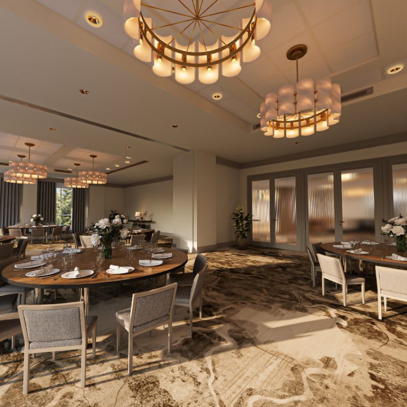 A beautiful meeting space at Rimrock Banff called Alpenglow with warm furnishings and mountain views.