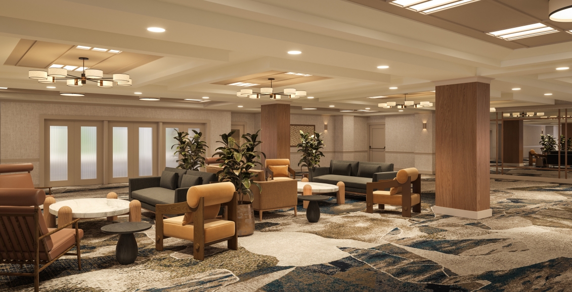 The Radiance Foyer at Rimrock Banff Emblems Collection. A warm room with soft textiles and neutral colours.