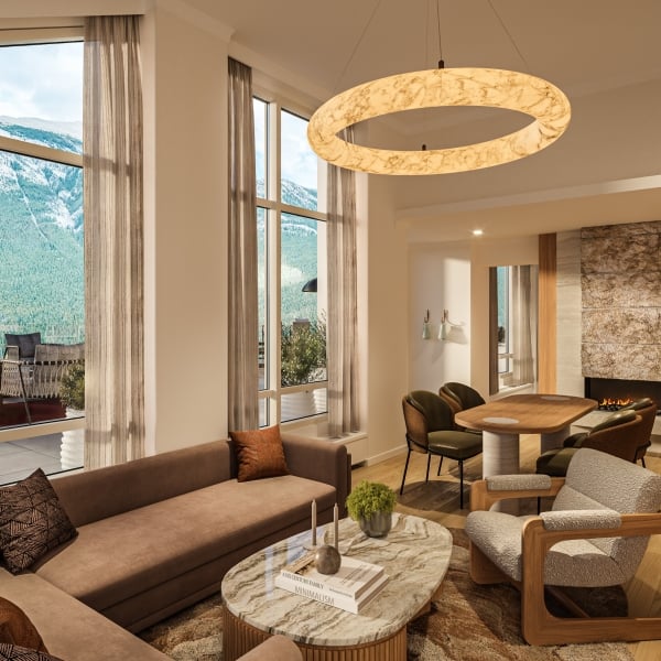 Rendering of the Infinity Suite at Rimrock Banff, Emblems Collection with warm furnishings and sweeping mountain views