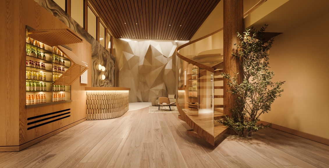 Juice bar at Rimrock Banff, Bathhouse with a climbing wall in the background.