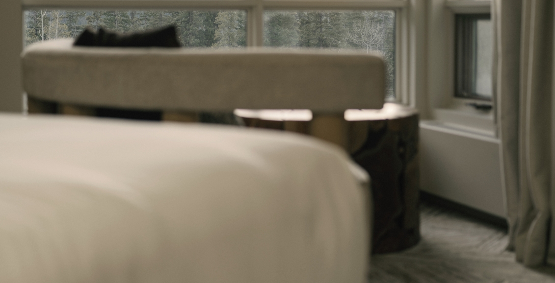 The view out of the bedroom of a Valley View Suite at Rimrock Banff, Emblems Collection